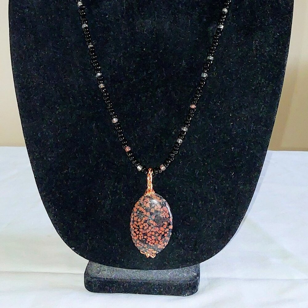 24" black glass bead necklace with 1 1/2" Ocean Jasper pendant